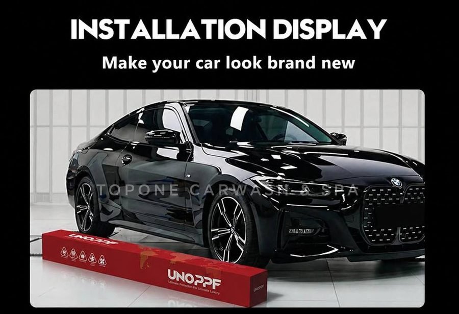 รถ BMW สีดำเงาจอดคู่กล่องฟิล์ม UNOPPF สีแดง ใต้หัวข้อ Installation Display